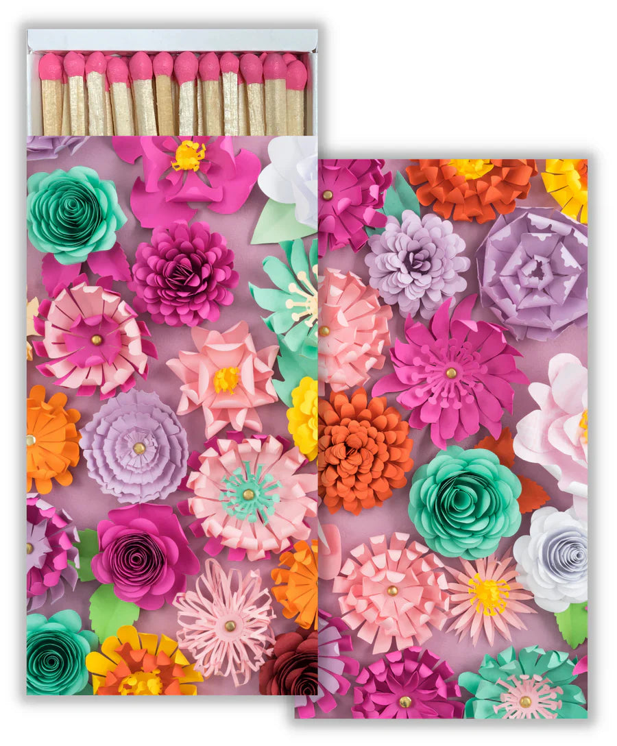 Matchbox with a Hawthorne Garden theme. Bird and Plant illustrations over a blue background.